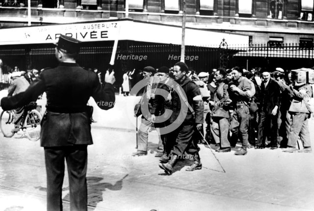 Demobilised French soldiers arriving at the Gare d'Austerlitz, Paris, 1945(?). Artist: Unknown
