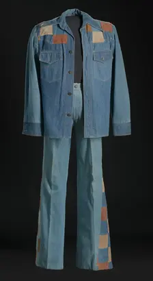 Denim and suede suit jacket and bellbottoms worn by Charley Pride, 1976. Creator: Unknown