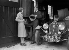 Denis Evans working on his Bugatti Type 43 2262cc. Artist: Bill Brunell