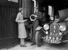 Denis Evans working on his Bugatti Type 43 2262cc. Artist: Bill Brunell