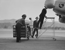Department of Agriculture plant quarantine inspectors, Glendale Airport, California, 1937. Creator: Dorothea Lange