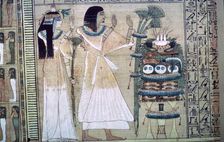 Depiction of a man and his wife making offerings to Osiris