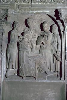 Depiction of Roman women's hair dressing on an altar