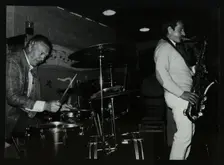 Derek Hogg (drums) and Bobby Wellins (saxophone) playing at The Bell, Codicote, Hertfordshire, 1985. Creator: Denis Williams