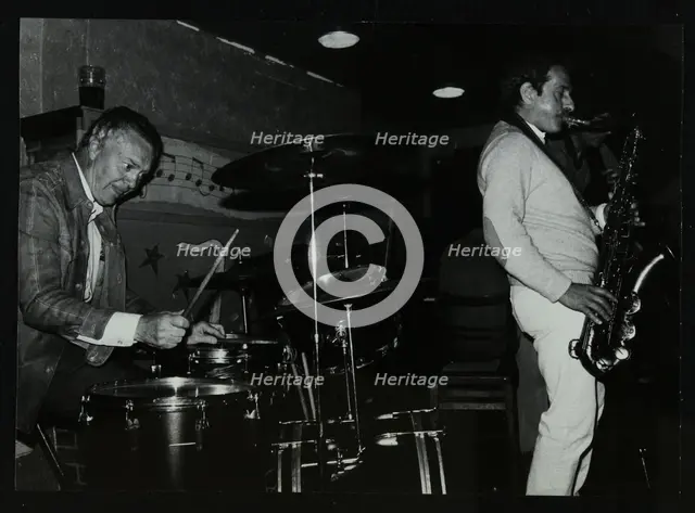 Derek Hogg (drums) and Bobby Wellins (saxophone) playing at The Bell, Codicote, Hertfordshire, 1985. Creator: Denis Williams.
