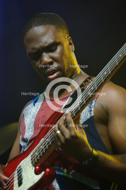 Derrick Hodge, Love Supreme Jazz Festival, Glynde Place, East Sussex, 2014. Artist: Brian O'Connor.