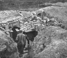 Derriere L'ennemi refoule; Entrée d'un abri, dans une tranchee allemande ligne 1915 (1924). Creator: Unknown