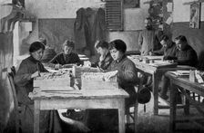 Des femmes dans les casernes; Au bureau de la mobilisation : le classement des fiches 1916. Creator: Unknown