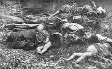 Des Victimes; Un impressionnant charnier, ou ne figurent que des femmes et des enfants... 1914. Creator: Unknown
