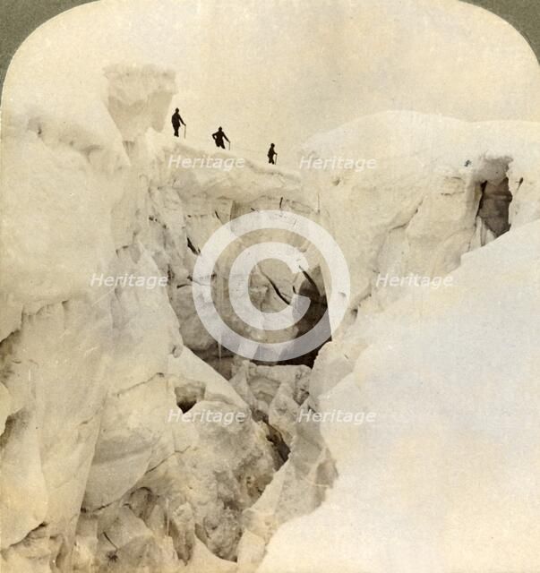 'Descent of Mt. Blanc - enormous crevasses near the summit, Alps', 1901. Creator: Underwood & Underwood.