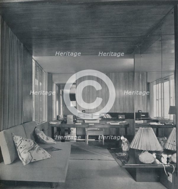 'Desk in bedroom-sitting room', 1942.  Artist: Unknown.