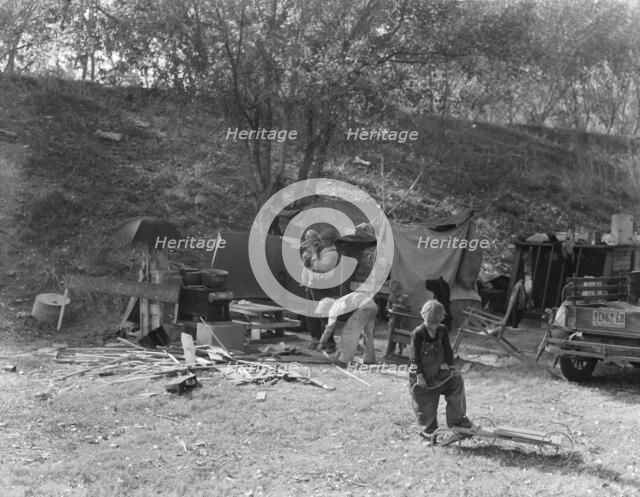 Destitute family, American River camp, near Sacramento, California., 1936. Creator: Dorothea Lange.