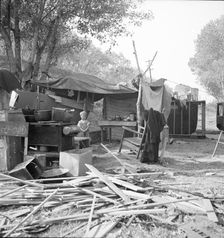 Destitute family, American River camp, Sacramento, California., 1936. Creator: Dorothea Lange