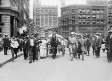D.H. Woolf and wife arriving in N.Y.C., 1910. Creator: Bain News Service