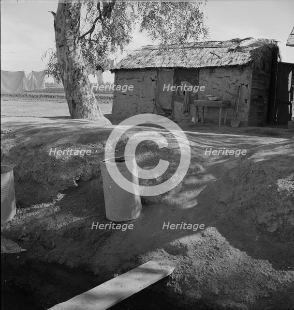 Ditch bank housing for Mexican field workers, Imperial Valley, California, 1937. Creator: Dorothea Lange.