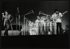 Dizzy Gillespie and guitarist Rodney Jones on stage, Beaulieu, Hampshire, July 1977. Creator: Denis Williams