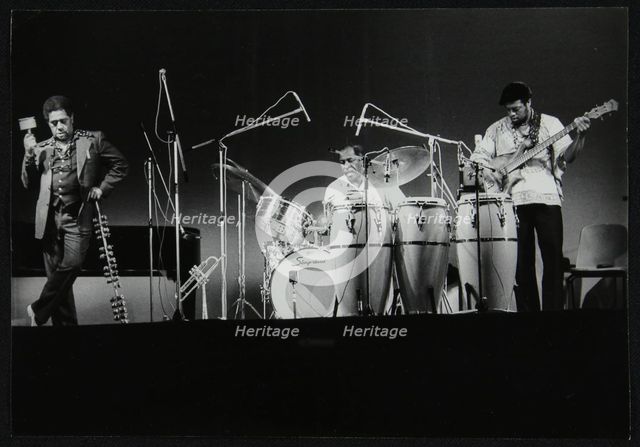 Dizzy Gillespie and guitarist Rodney Jones on stage, Beaulieu, Hampshire, July 1977. Creator: Denis Williams.