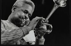 Thumbnail image of Dizzy Gillespie performing with the Royal Philharmonic Orchestra, Royal Festival Hall, London, 1985. Artist: Denis Williams