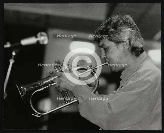 Dick Pearce playing the flugelhorn at The Fairway, Welwyn Garden City, Hertfordshire, 1999. Creator: Denis Williams.