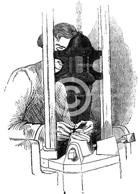 Die-stamping the channel and eye position on needle wires, Redditch, England, c1835. Artist: Unknown