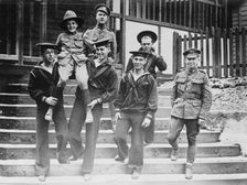 Digby Morton, Phila. Boy Scout, and U.S. Jackies at "Eagle" hut in London, between c1915 and 1918. Creator: Bain News Service