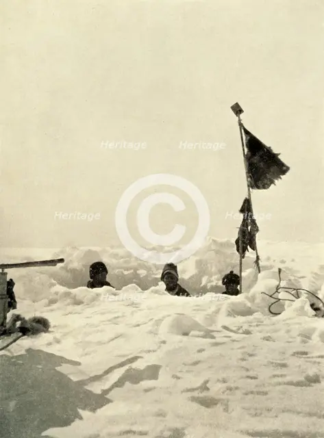 'Digging to ascertain the depth of snow covering a depot', c1908, (1909).  Artist: Unknown.