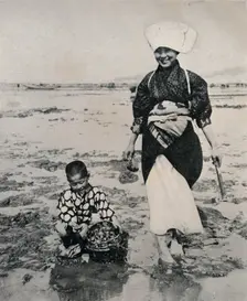 Digging clams at low-tide in Tokyo Bay c1900, (1921). Artist: Julian Leonard Street
