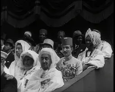 Dignitaries and Representatives from Various African Countries Sitting in Raked Seats at a..., 1939. Creator: British Pathe Ltd