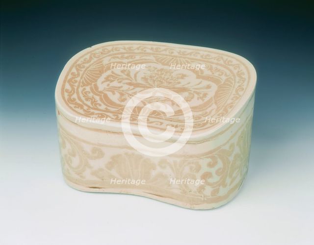 Ding bean-shaped pillow with sgraffito lotus design, Jin dynasty, China, 12th century. Creator: Unknown.