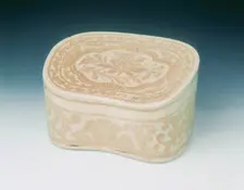 Ding bean-shaped pillow with sgraffito lotus design, Jin dynasty, China, 12th century. Creator: Unknown
