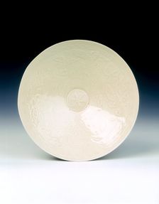 Ding bowl with phoenixes amid camellia scrolls, Jin dynasty, China, late 12th century. Creator: Unknown