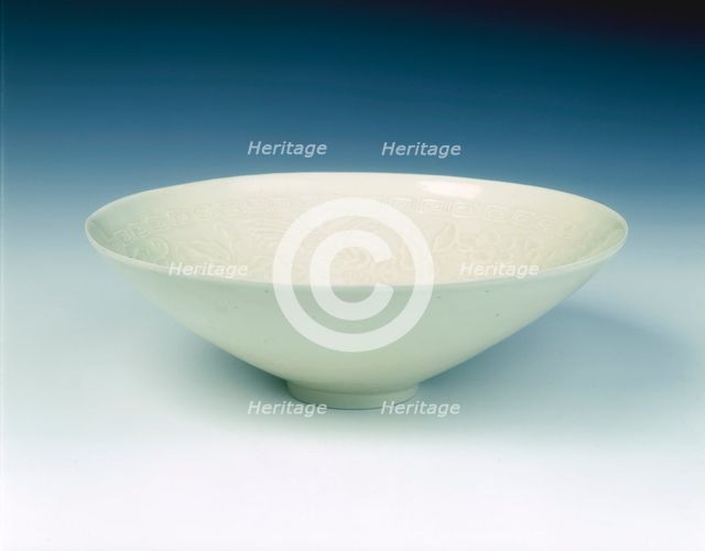 Ding bowl with phoenixes amid camellia scrolls, Jin dynasty, China, late 12th century. Creator: Unknown.