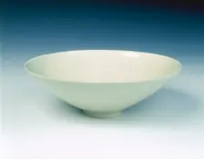 Ding bowl with phoenixes amid camellia scrolls, Jin dynasty, China, late 12th century. Creator: Unknown