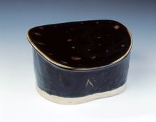 Ding black glazed pillow with hatched moulding, Jin dynasty, China, 12th century