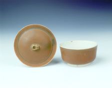 Ding persimmon red glazed covered bowl with white glazed interior, Jin dynasty, China, 12th century