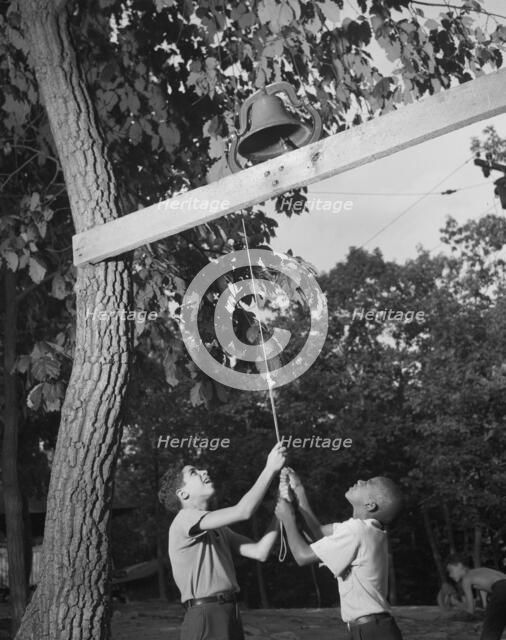 Dinner bell, Camp Nathan Hale, Southfields, New York, 1943 Creator: Gordon Parks.