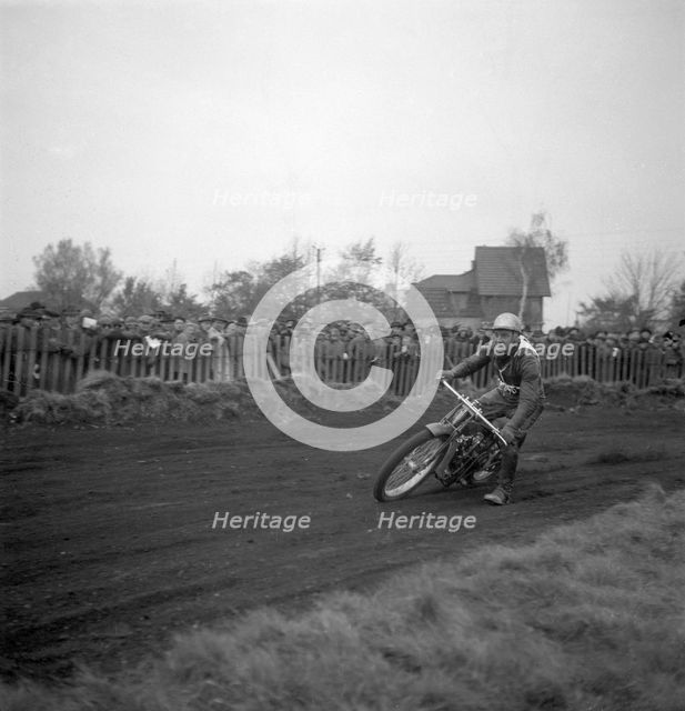 Dirt track motorcycle racing, Arlöv, Scania, Sweden, 1947. Creator: Otto Ohm.