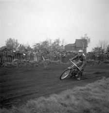 Dirt track motorcycle racing, Arlöv, Scania, Sweden, 1947. Creator: Otto Ohm