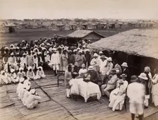 Discharged hospital patients after bubonic plague outbreak, being given relief money..., 1897. Creator: Unknown