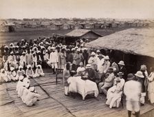 Discharged hospital patients after bubonic plague outbreak, being given relief money..., 1897. Creator: Unknown