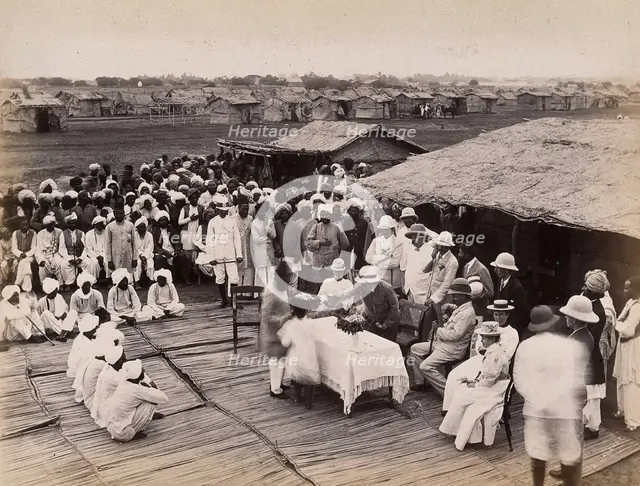 Discharged hospital patients after bubonic plague outbreak, being given relief money..., 1897. Creator: Unknown.