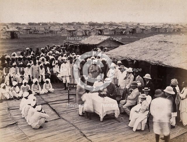 Discharged hospital patients after bubonic plague outbreak, being given relief money..., 1897. Creator: Unknown.