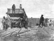 Discharging Guano-Wagons; About the Chincha Islands 1875. Creator: Unknown