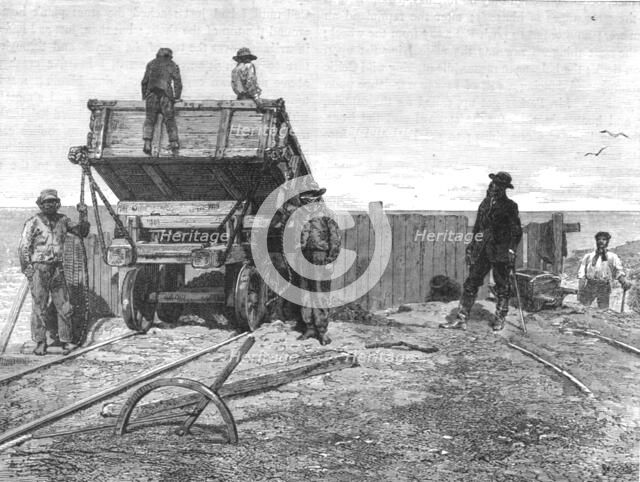 'Discharging Guano-Wagons; About the Chincha Islands', 1875. Creator: Unknown.