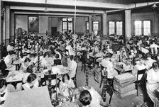 Disabled girls working at the Watercress and Flower Girls Christian Mission London, 1926-1927