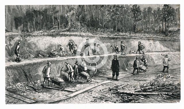 Disassembling works by Chinese workers during the construction of the Trans-Siberian Railway, eng…