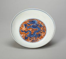 Dish with Dragon Writhing amid Waves, Qing dynasty (1644-1911), Kangxi reign (1662-1722). Creator: Unknown