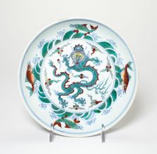 Dish with Dragon amid Flames Encircled by Fish amid Waves, Qing dynasty, 18th/19th century. Creator: Unknown