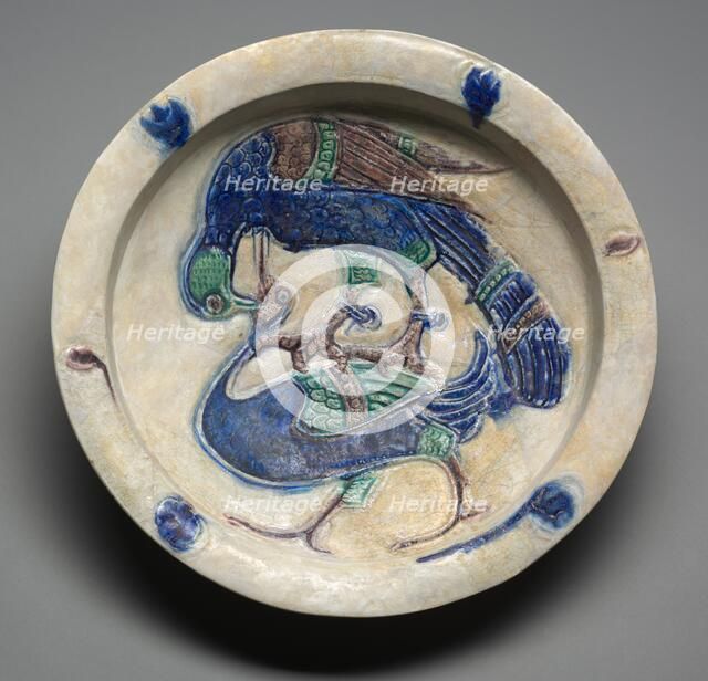 Dish with Falcon Attacking a Water Bird, 1100s. Creator: Unknown.