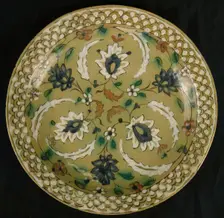 Dish with Floral Designs on an Olive Background, Iran, 16th-17th century. Creator: Unknown